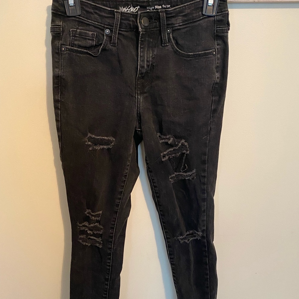 black ripped jeans